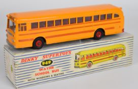 Dinky Supertoys diecast model Wayne School Bus with yellow body, red trim, hubs and interior, 949,