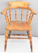 Elm seated armchair with scroll arms, height 82cm