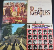 Twenty eight Rock LPs including The Beatles Yeah! Yeah! Yeah! A Hard Day's Night and Sgt Pepper's