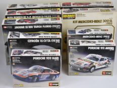 Nine Burago 1:18 and 1:24 scale diecast Metalkit cars to include Ferrari 250 GT0, Jaguar E Coupé,