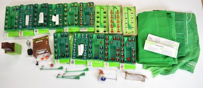 A collection of Subbuteo items including teams, goals, scoreboard, pitch etc, the majority in