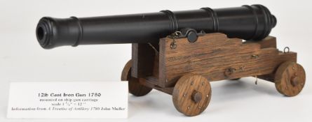 Prize winning exhibition quality model of a 12lb cast iron gun or cannon, on ship's gun carriage,