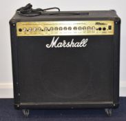Marshall MG -100 DFX electric guitar amplifier.