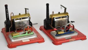 Two Mamod SE4 live steam stationary engines, both with single cylinder oscillating engines, one also