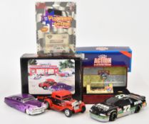 A small collection of American NASCAR and Hot Rod diecast model cars, all in original boxes.