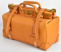 Contemporary tan leather Gladstone bag, appears unused, with original Fortnum and Mason receipt, W47