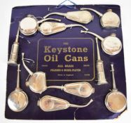 Keystone Oil Cans vintage carded shop display of twelve nickel plated vintage car, motorcycle or