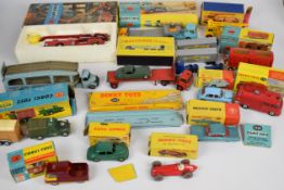 A collection of vintage Corgi, Dinky and Matchbox diecast model cars and trucks to include Simon