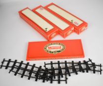 Mamod 0 gauge model railway track comprising straight, curved and points, in original boxes.