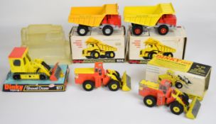 Five vintage Dinky Toys diecast model construction vehicles comprising Shovel Dozer 977, Eaton