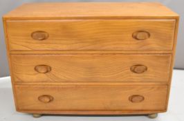Ercol light elm mid century modern chest of three drawers, W91 x D43 x H65.5cm