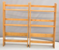 Pair of oak Arts & Crafts style bookcases with slat shelves, W69 x D24 x H122cm