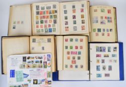 A large stamp collection in various albums and volumes, including 5c China small dragon M and