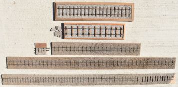 Seven model railway display track sections to suit live steam or similar models, most 0 gauge, two