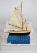 Ten Hanah model wooden boats including narrow and sailing varieties, average length 30cm.