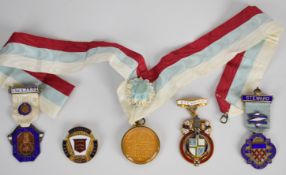 Mason jewels including one 9ct gold mounted, two hallmarked silver Steward's jewels for Royal
