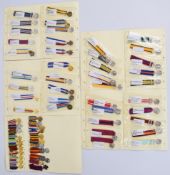 Approximately sixty British Military miniature medals including Victoria Cross, Distinguished