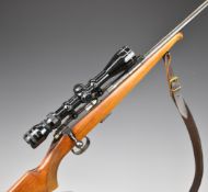 BRNO Model 2 .22 bolt-action rifle with chequered semi-pistol grip, multi-shot magazine, leather