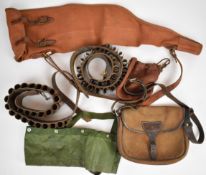 A collection of shooting and gun related items including shooting jackets, boot bags, shotgun and