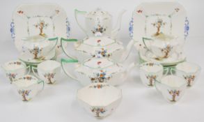 Shelley tea set for six with additional items including three tea / coffee pots, decorated in the