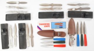Seven sets of throwing knives, all in pouches, two sets with coloured handles, the longest blade 9.