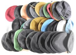 Twenty four British Forces berets, nineteen with badges including Royal Navy, Royal Marines, Royal