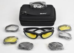 A pair of Daisy shooting glasses with four sets of interchangeable lenses, unused in original fitted