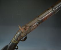 Percussion hammer action blunderbuss with applied metal decoration to the stock, scrolling brass