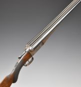 F Baxter 10 bore side by side shotgun with engraved lock, trigger guard, thumb lever, fences and