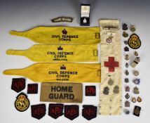 Collection of WW2 era and later Civil Defence ephemera including four ARP badges (two hallmarked