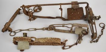 Five various animal traps including Li-Lo, largest 48cm long.