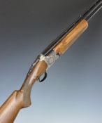 Miroku 12 bore over and under ejector shotgun with engraved locks, trigger guard, thumb lever and