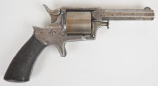 Tranter .32 seven-shot single action rimfire revolver with chequered wooden grips, sheath trigger,
