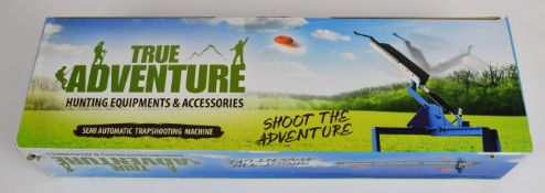 True Adventure semi-automatic clay pigeon shooting trap, unused in original box.