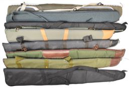 Eight various padded gun slips including Beretta, Buffalo River, Napier, Klever Sport etc