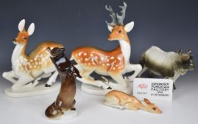 Lomonosov / USSR porcelain wild animal figures and a point of sale advertising sign, including a