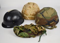 American Vietnam era helmet with lightweight inner, together with a British post-WW2 combat helmet
