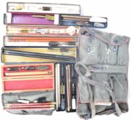Eleven various shotgun or rifle cleaning kits including one in fold out canvas case, Bisley,