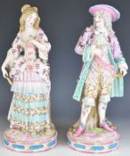 Pair of 19th / 20thC German porcelain figural spill vases (one spill plugged), height 36cm