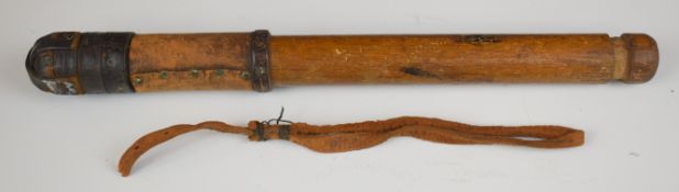 WW1 era gentleman's or humane trench club with wooden shaft, nailed on leather head and carry strap
