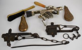 Two vintage animal traps, one a 'Plumb Bob' and two copper shot flasks etc
