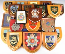 Approximately twenty four wall plaques including Special Air Service, 1st The Queen's Dragoons