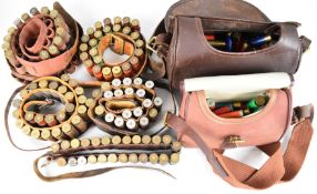 Approximately two hundred mainly 12 bore shotgun cartridges all in cartridge bags and belts.