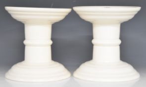 Pair of ham stands marked G Rushbrook Ltd, Smithfield, height 20cm