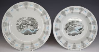 Two Eric Ravilious for Wedgwood plates from the 'Travel' Series, featuring an aeroplane and train,