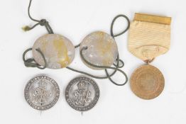 British WW1 Red Cross Medal together with two silver wound badges and a pair of identity discs for