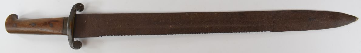 Continental sawback pioneer's short sword with wooden grips, down swept crosspiece and a 53cm