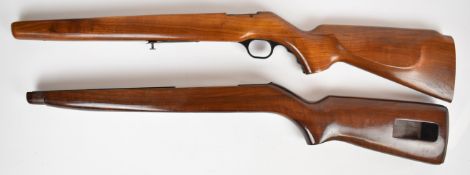Two wooden bolt-action rifle stocks each with semi-pistol grip, largest 76cm long.
