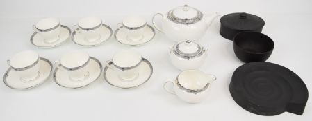 Wedgwood tea set decorated in the Amhurst pattern, together with three pieces of Black Basalt