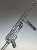 German Sport Guns (GSG) MP40  .22 semi-automatic assault style rifle with textured pistol grip,